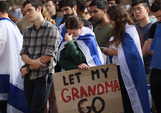 Cambridge, MA - October 11: Hannah Friedman reacts during a rally in support of Israel at MIT. She does not have a grandmother in custody but saw the sign as a symbol like Let My People Go. (Nancy Lane/Boston Herald)